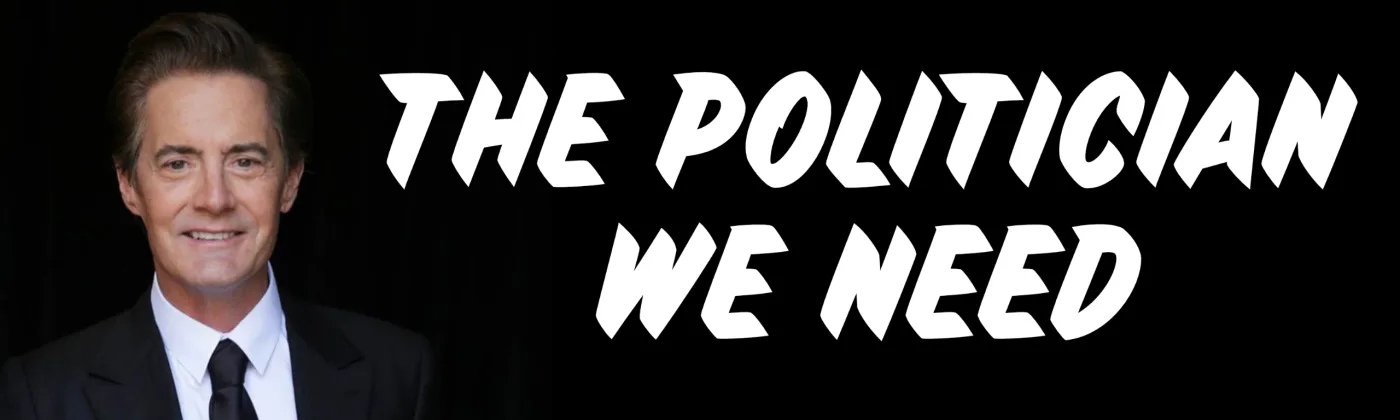 Black bumper sticker that reads "The politician we need" in white brush lettering beside a photo of a smiling man in a dark suit and tie.