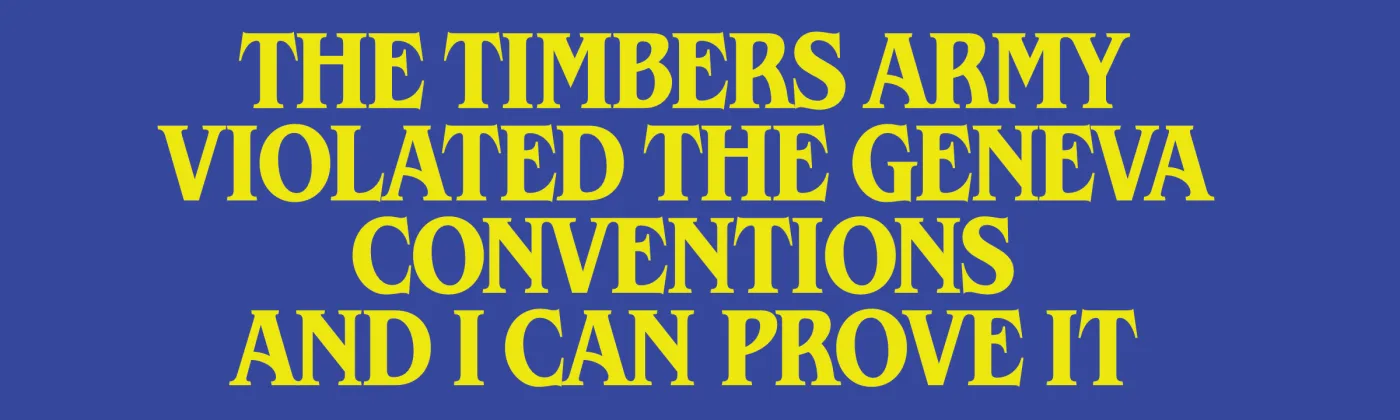 Blue bumper sticker in yellow capitals that reads "The Timbers Army violated the Geneva Conventions and I can prove it."